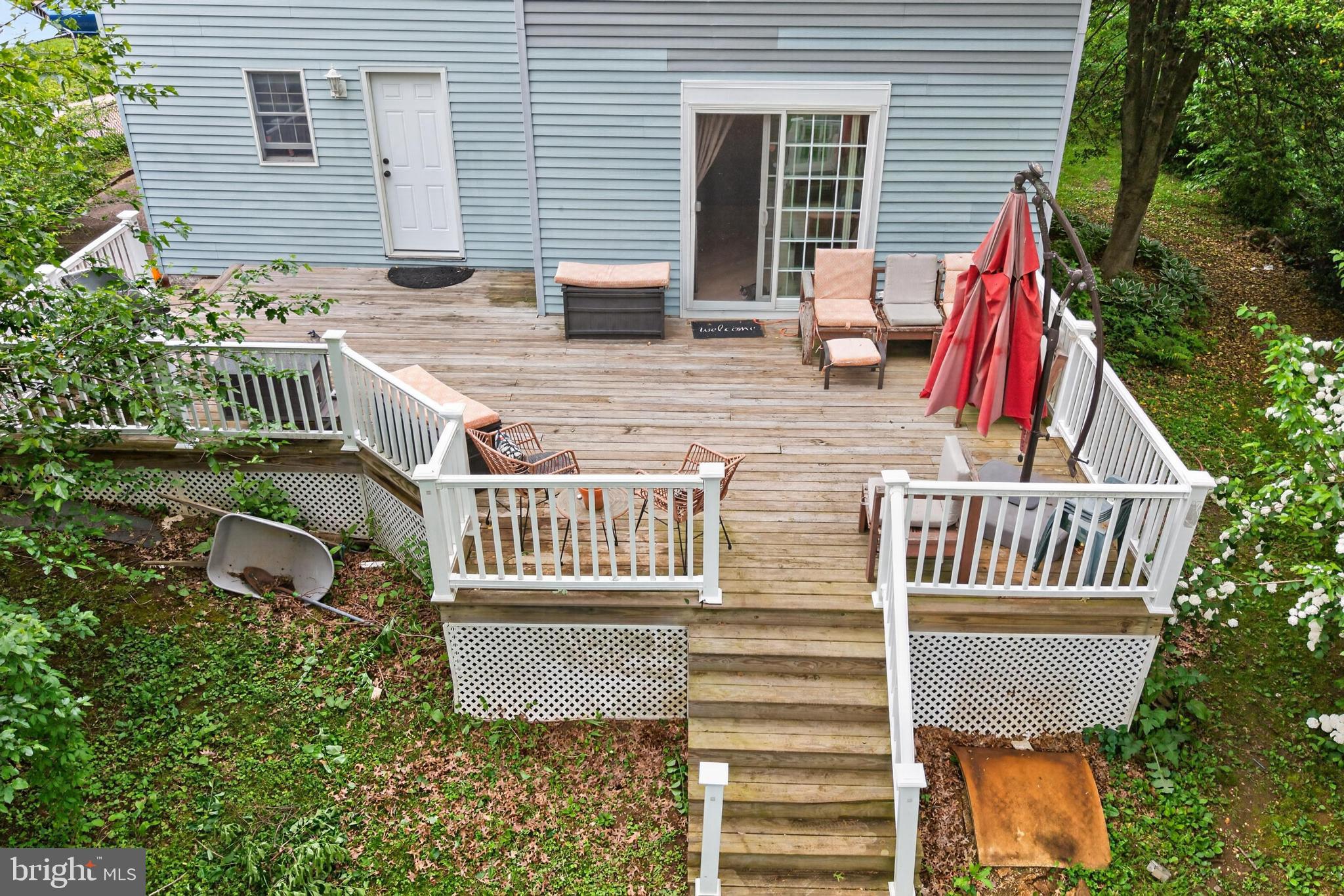 306 Anna Avenue Maple Shade, NJ 08052 - Photo 30 of 31 Charming deck nestled in lush greenery.