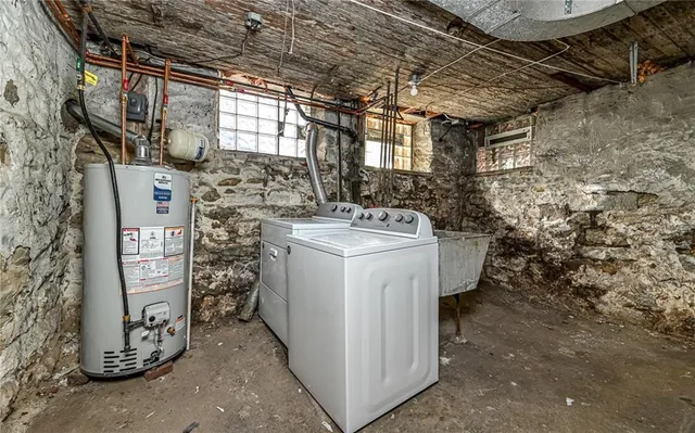 a utility room with dryer and washer