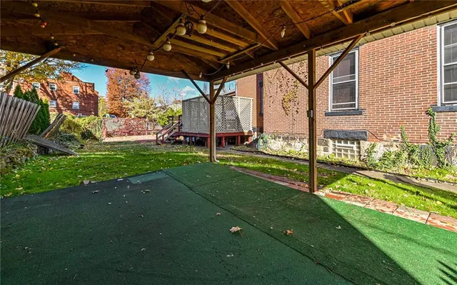 a view of a porch with a backyard