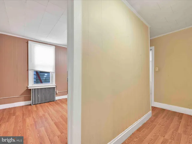 a bathroom with a sink toilet vanity and tub