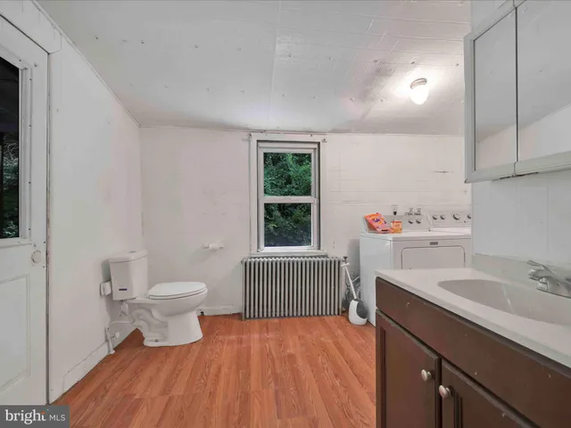 a utility room with washer and dryer