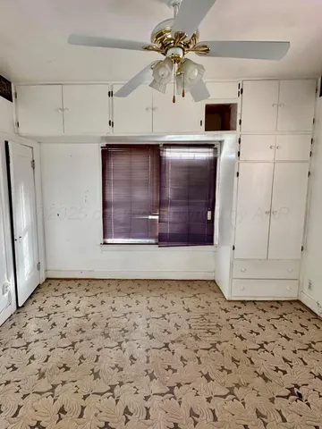 a view of a hallway with a stove