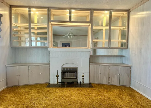 a view of a livingroom with a fireplace