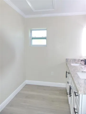 a view of a kitchen with a sink