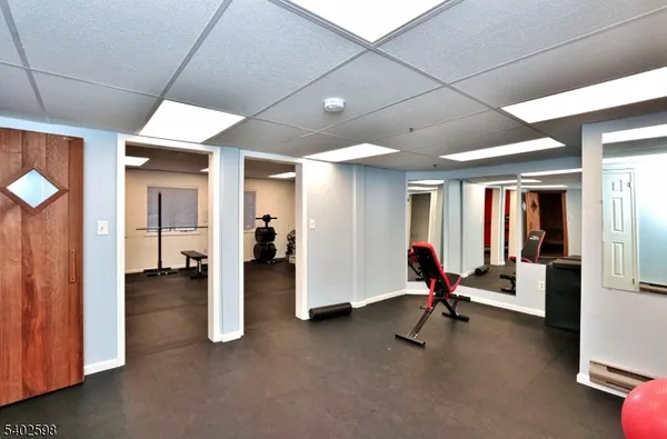 a view of a livingroom with furniture and windows