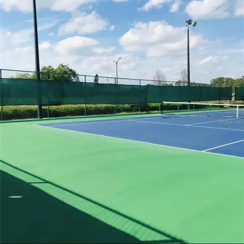 a view of a golf course with a lake
