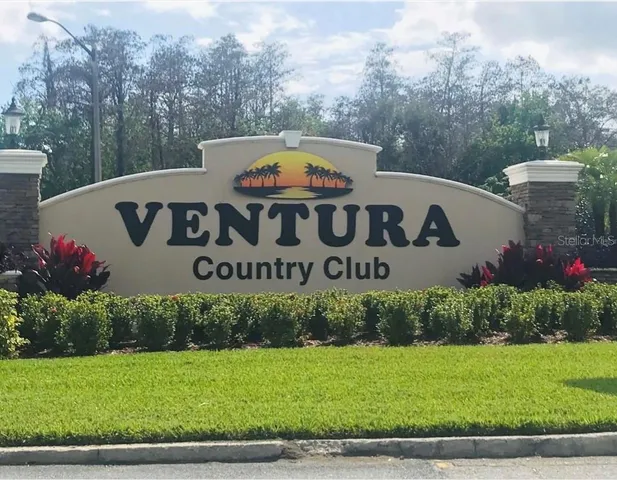 a sign on the side of the road