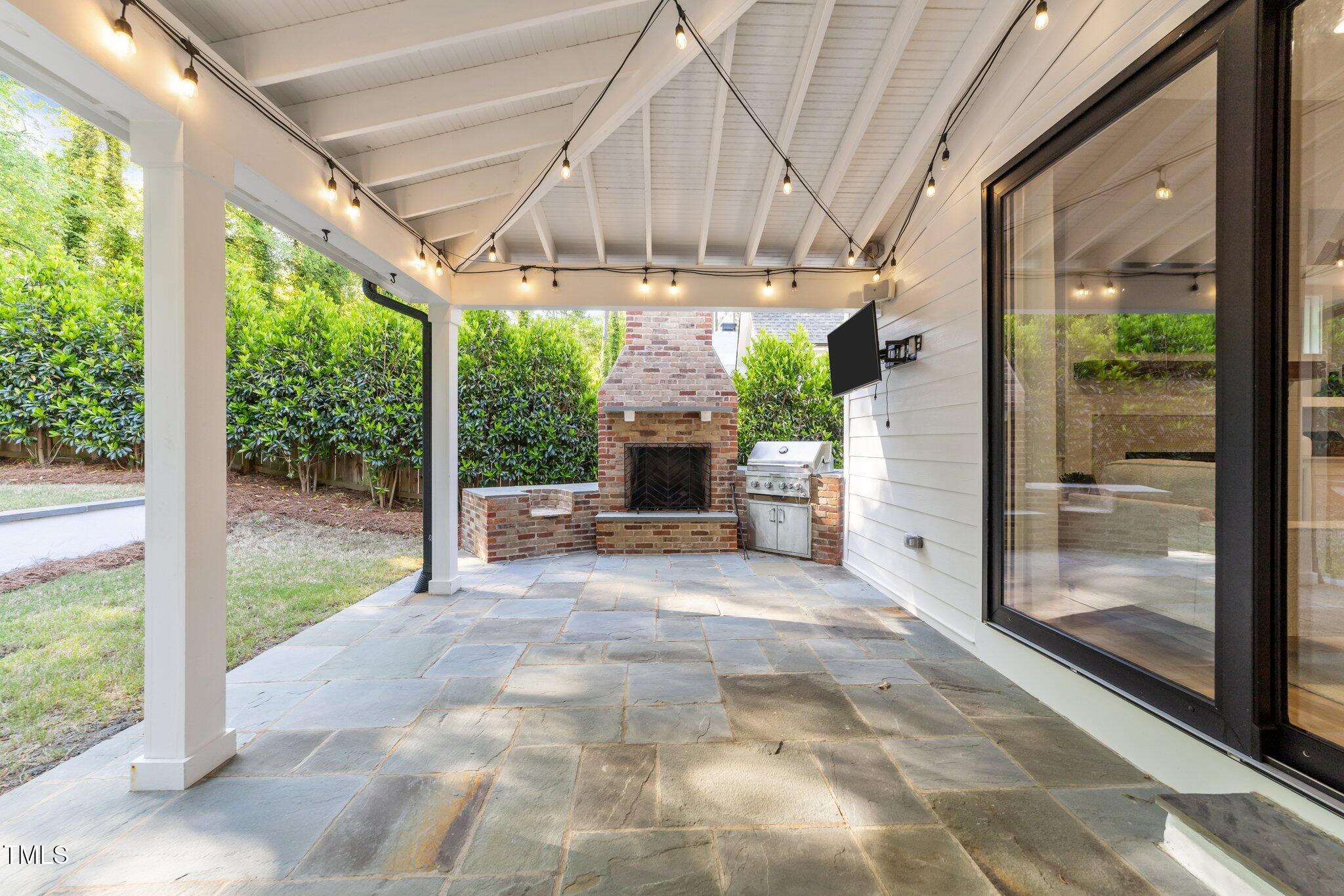 3316 Milton Road Raleigh, NC 27609 - Photo 13 of 50 a view of a porch and garden