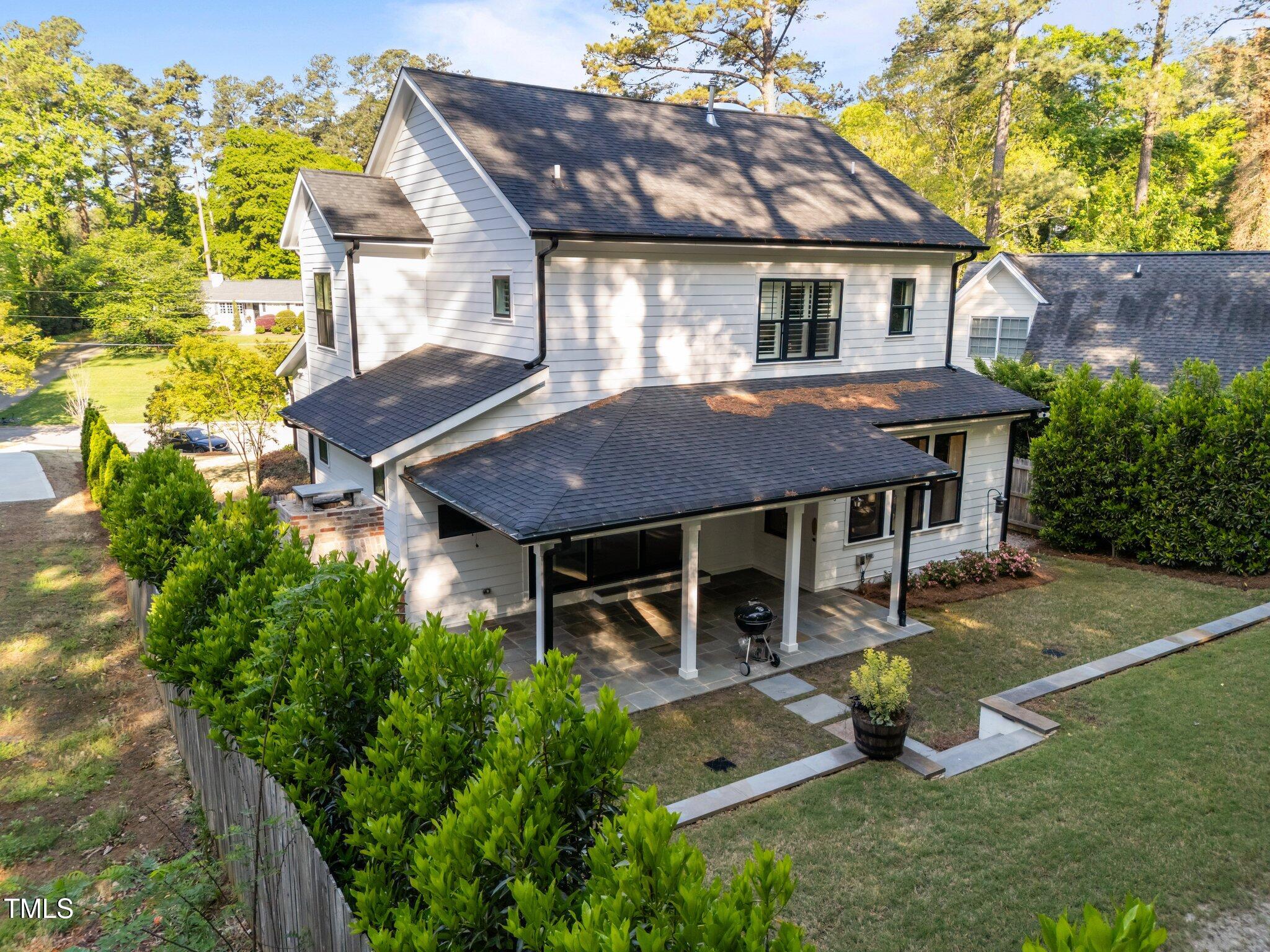 3316 Milton Road Raleigh, NC 27609 - Photo 39 of 50 a aerial view of a house with a yard porch and sitting area