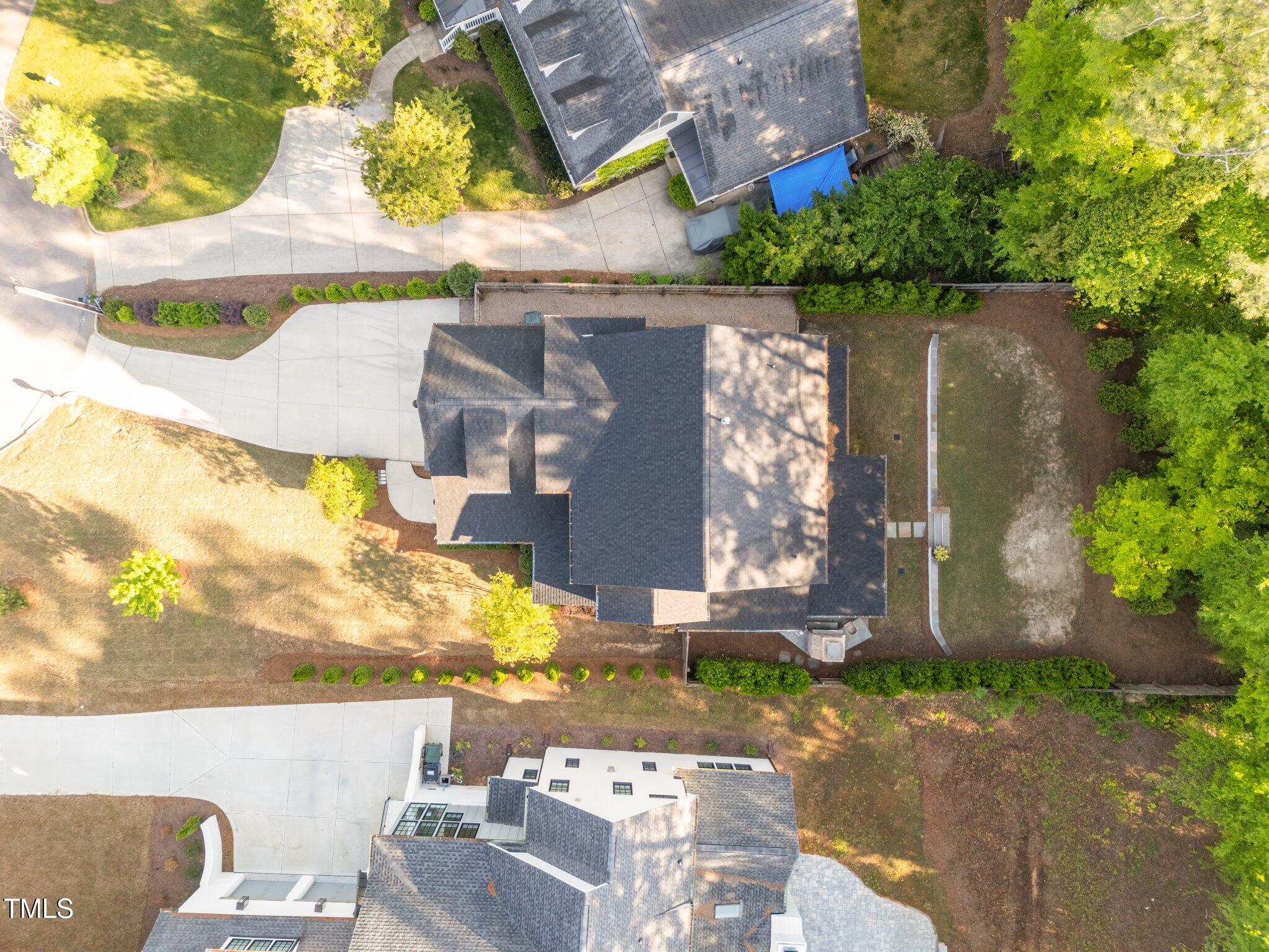 3316 Milton Road Raleigh, NC 27609 - Photo 47 of 50 an aerial view of a house with yard swimming pool and outdoor seating