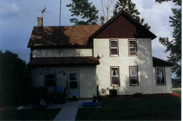 5008 East Skene Road Stockton, IL 61085 - Photo 4 of 9 a front view of a house with a yard