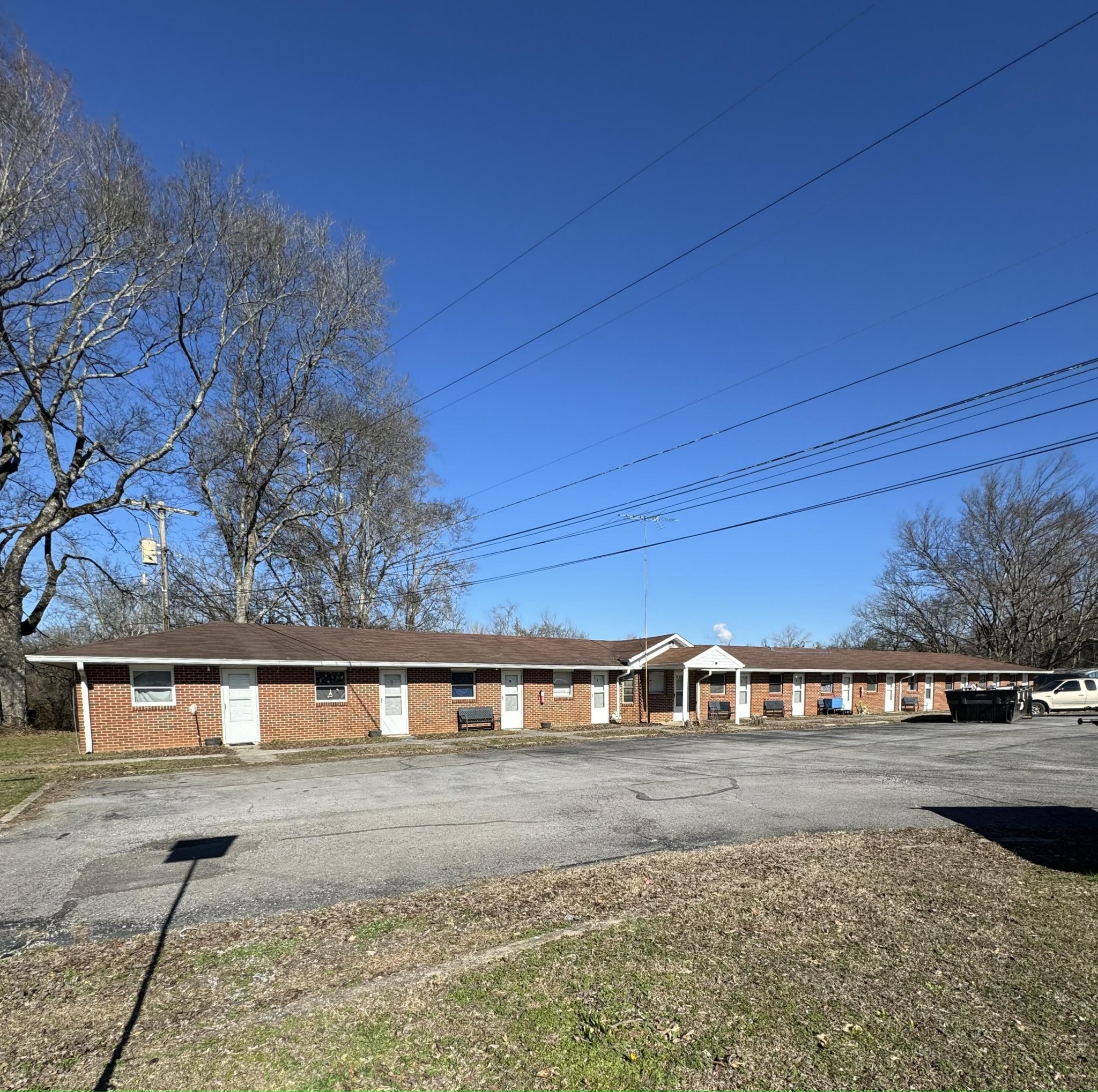 16365 Highway 58 Decatur, TN 37322 - Photo 1 of 5 a front view of a house with a yard