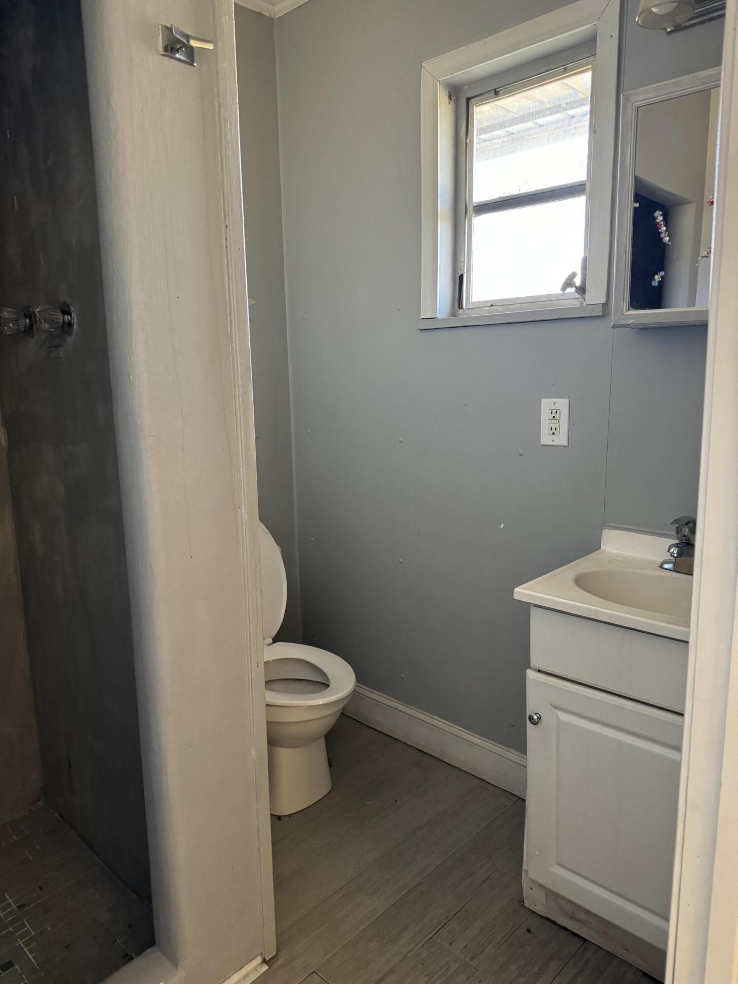 16365 Highway 58 Decatur, TN 37322 - Photo 5 of 5 a bathroom with a toilet sink and window