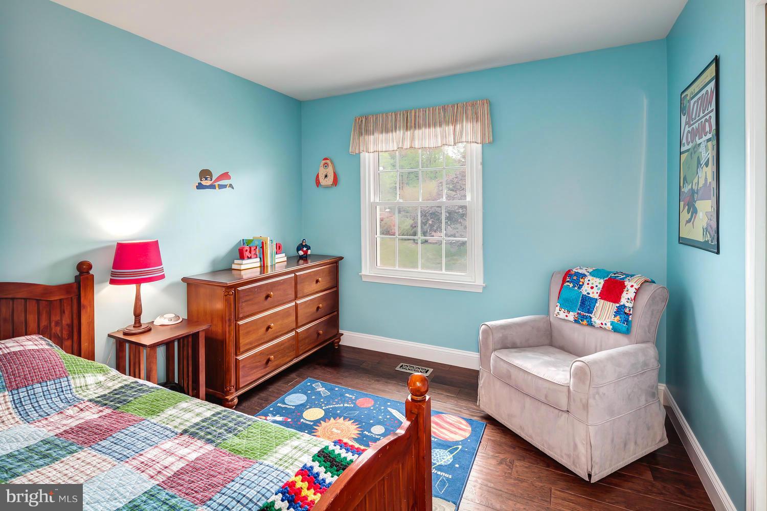 9148 Rockefeller Lane Springfield, VA 22153 - Photo 20 of 29 a living room with furniture and a dresser