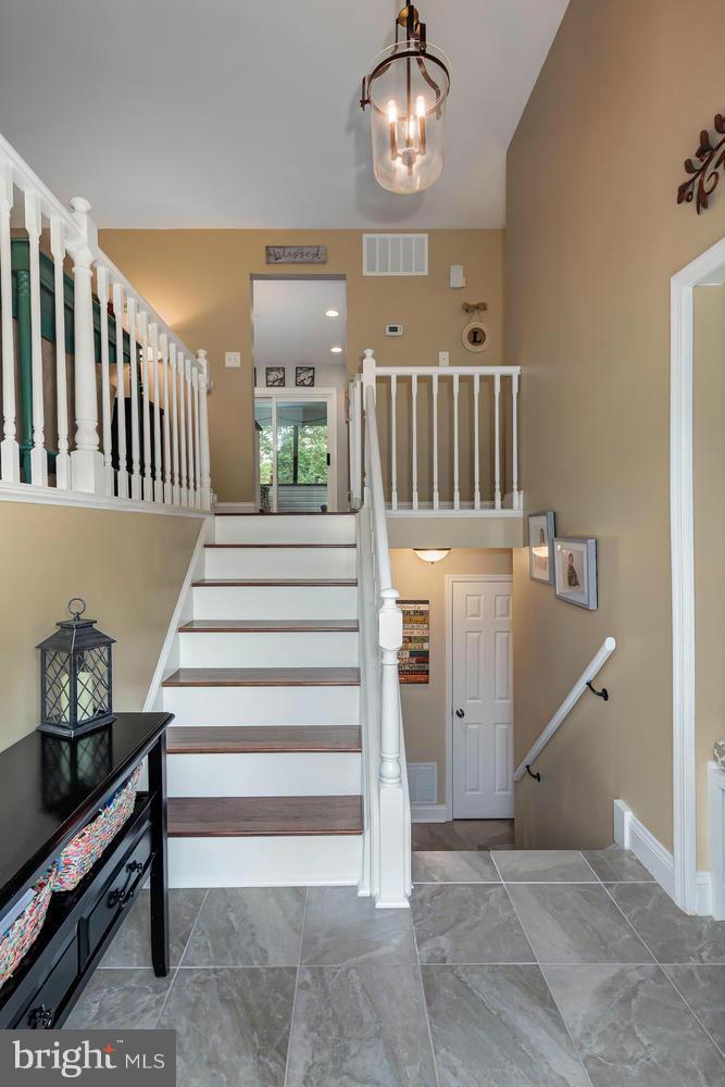 9148 Rockefeller Lane Springfield, VA 22153 - Photo 3 of 29 a view of entryway and hall