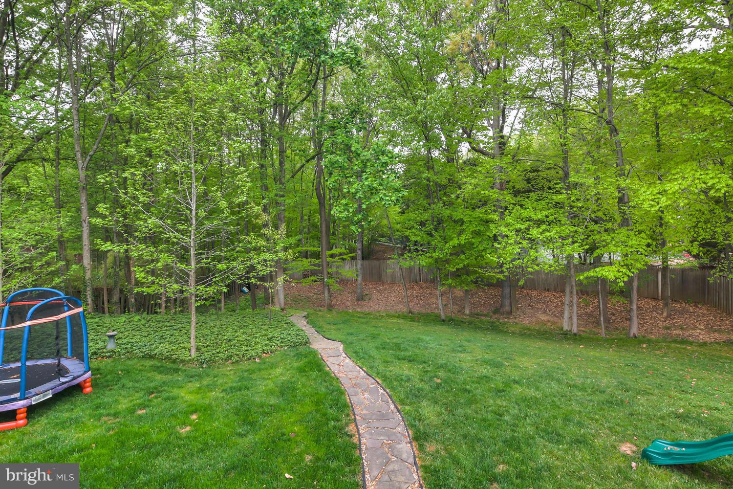 9148 Rockefeller Lane Springfield, VA 22153 - Photo 29 of 29 a view of a backyard with a garden