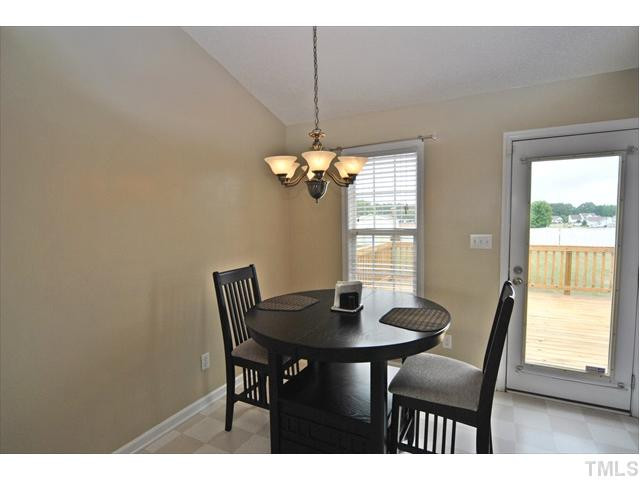 144 Wagner Road Willow Spring, NC 27592 - Photo 4 of 19 a dining room with furniture and window