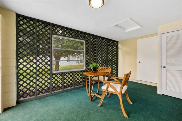a work room with furniture and wooden floor