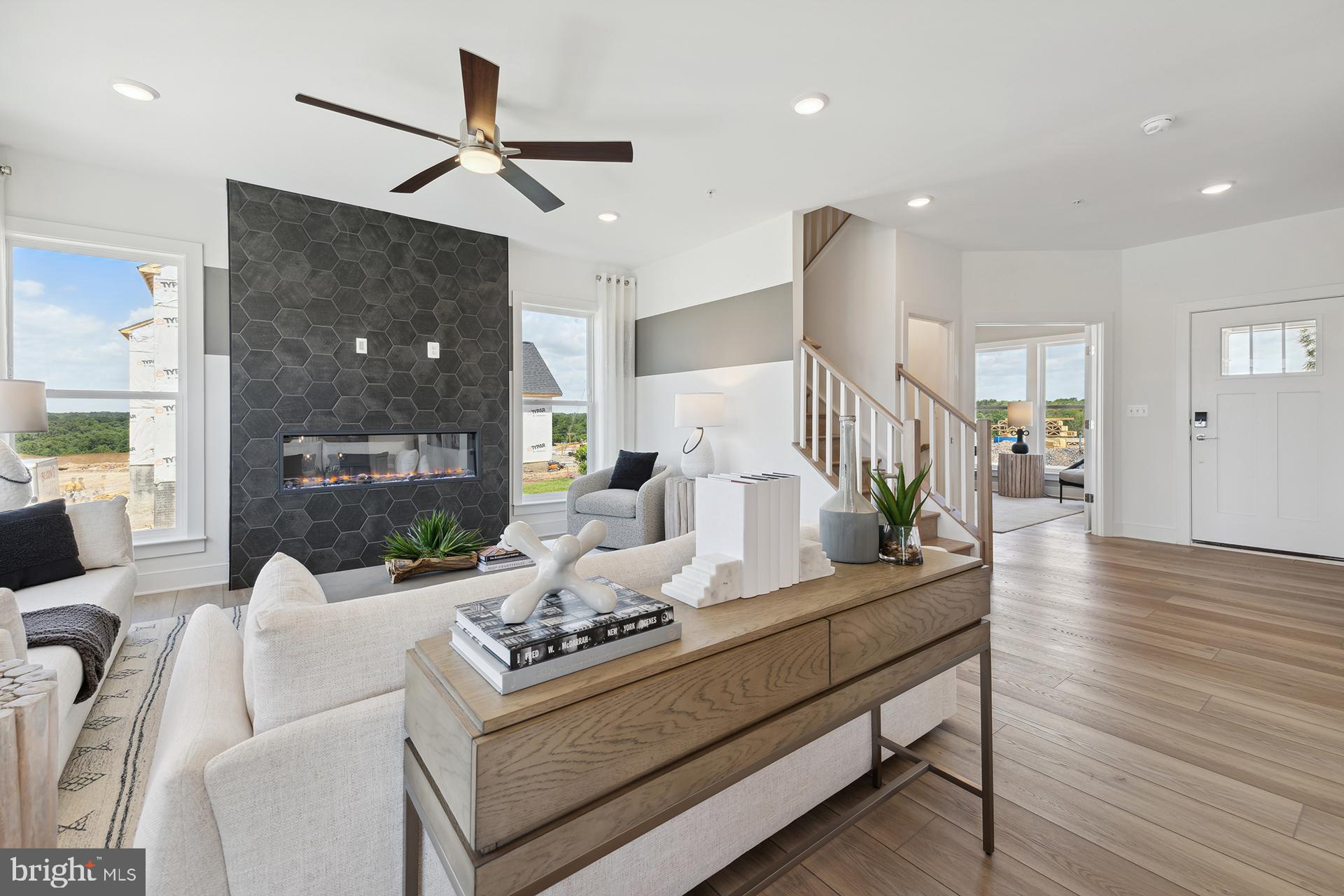 14404 Dowitcher Way Boyds, MD 20841 - Photo 11 of 54 a living room with furniture and wooden floor
