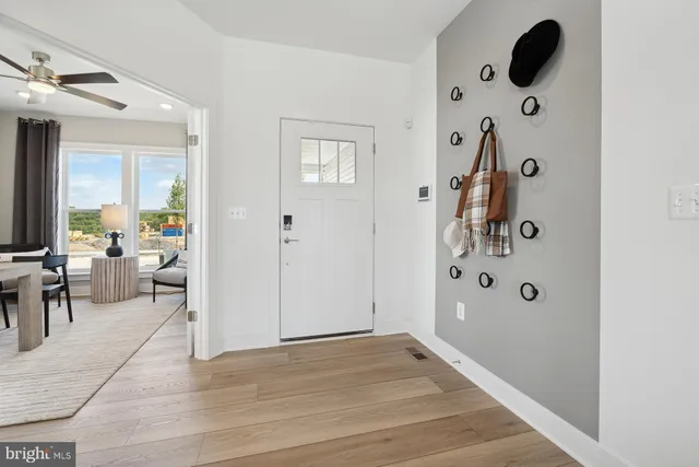 a view of a livingroom with furniture and windows