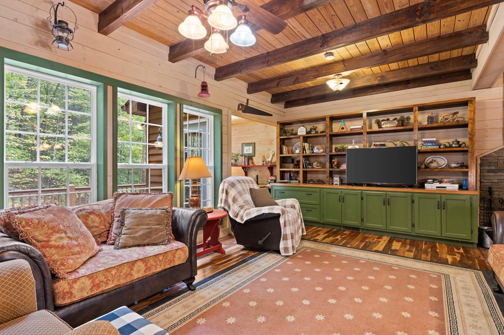 540 Old Mill Road Suches, GA 30572 - Photo 12 of 51 a living room with furniture and a large window