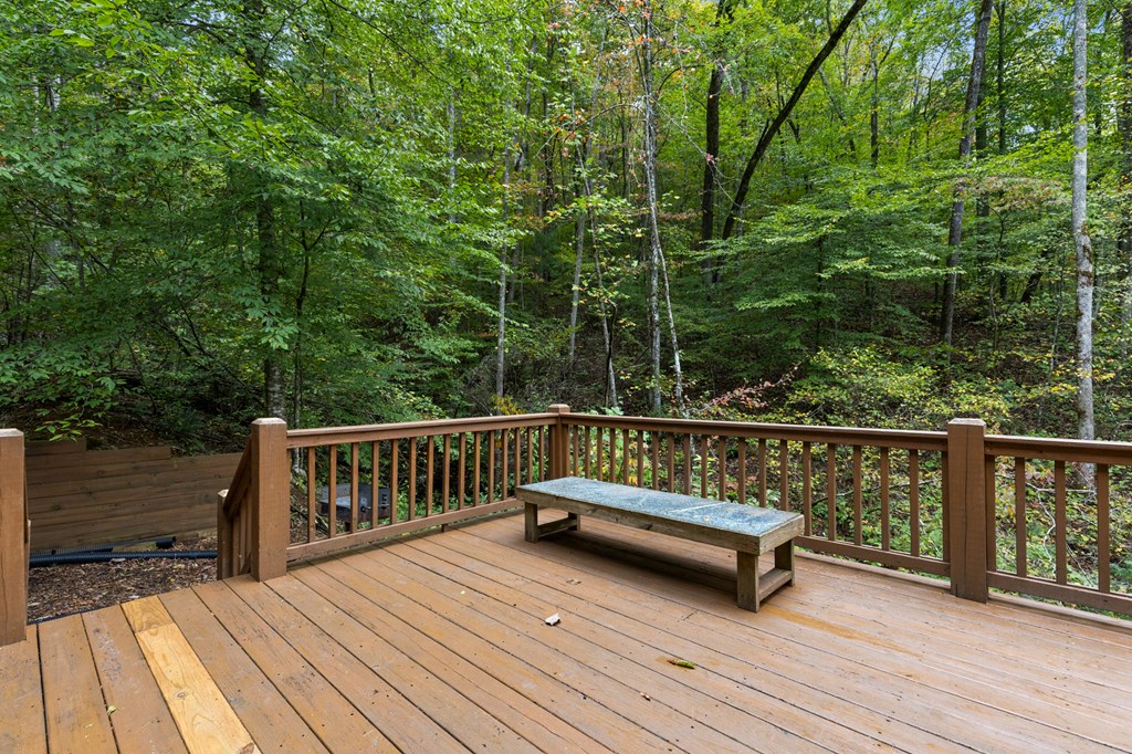 540 Old Mill Road Suches, GA 30572 - Photo 15 of 51 a view of balcony with wooden floor and outdoor seating