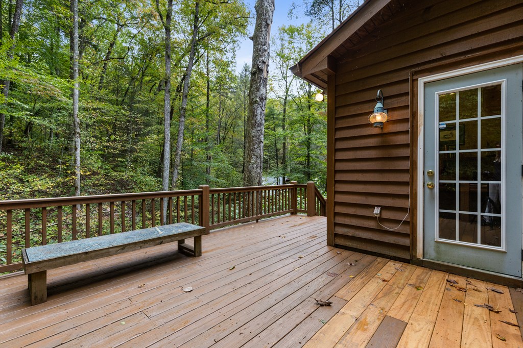 540 Old Mill Road Suches, GA 30572 - Photo 16 of 51 a view of balcony with wooden floor and fence
