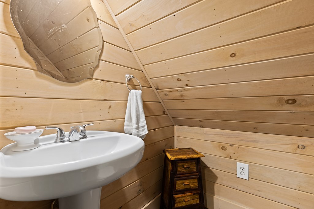 540 Old Mill Road Suches, GA 30572 - Photo 23 of 51 a bathroom with a sink and vanity