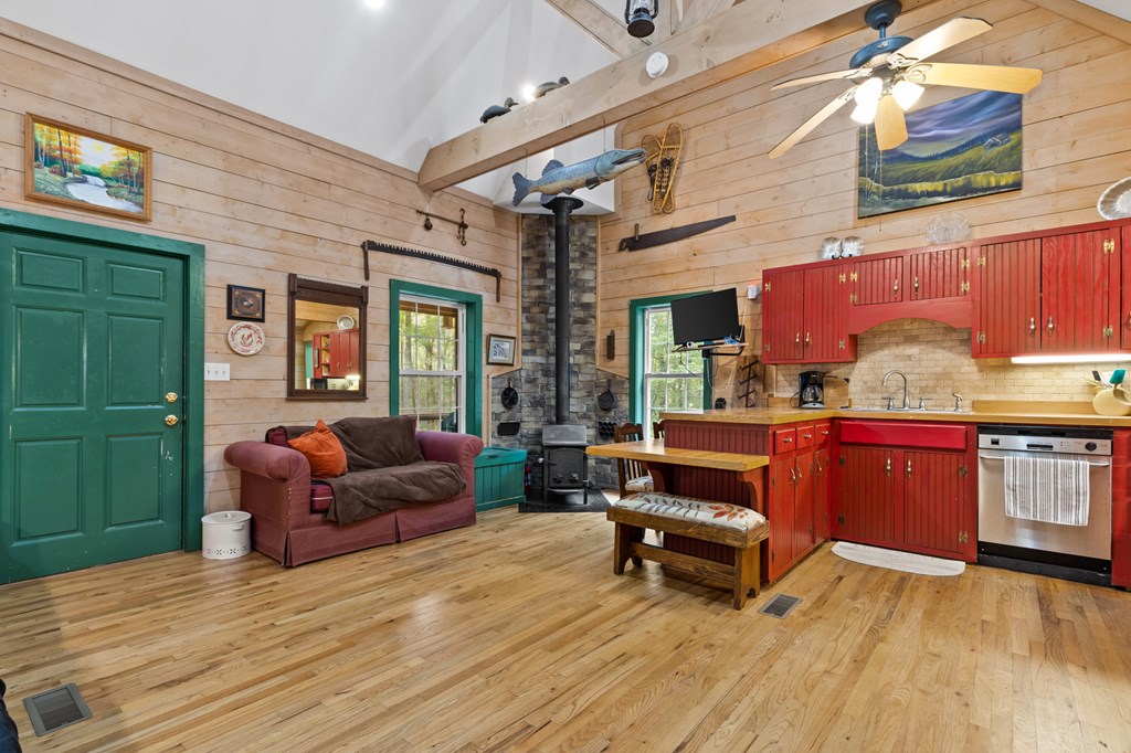 540 Old Mill Road Suches, GA 30572 - Photo 29 of 51 a living room with furniture and a wooden floor