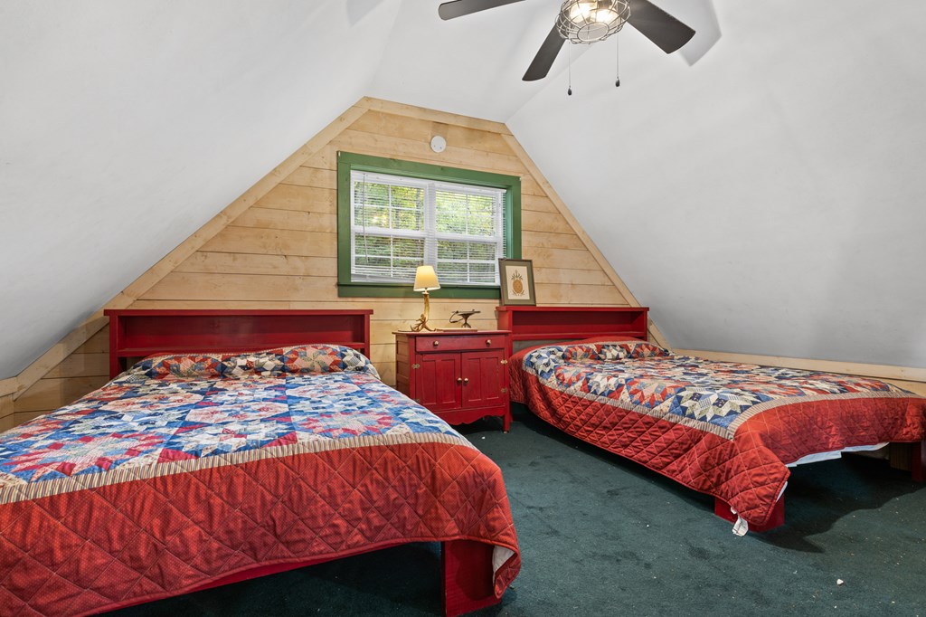 540 Old Mill Road Suches, GA 30572 - Photo 34 of 51 a bedroom with two beds and window