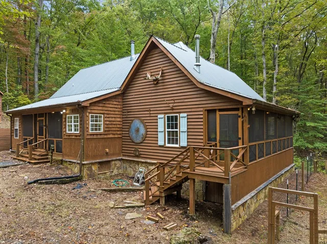 a house with trees in the background
