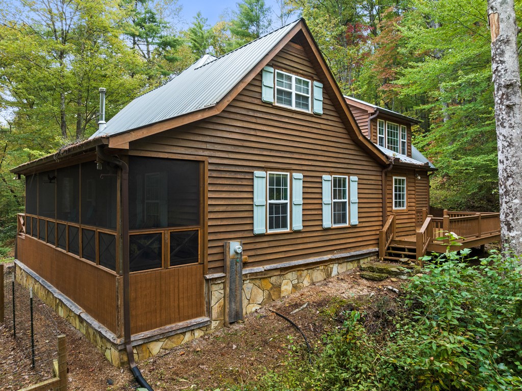 540 Old Mill Road Suches, GA 30572 - Photo 43 of 51 a house with trees in the background