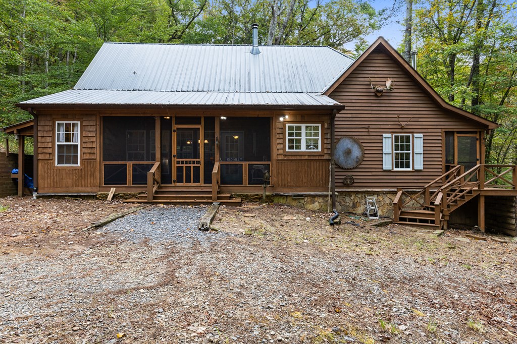540 Old Mill Road Suches, GA 30572 - Photo 46 of 51 front view of a house with a yard