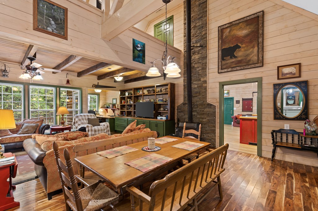 540 Old Mill Road Suches, GA 30572 - Photo 5 of 51 a view of a dining table and chairs in a patio