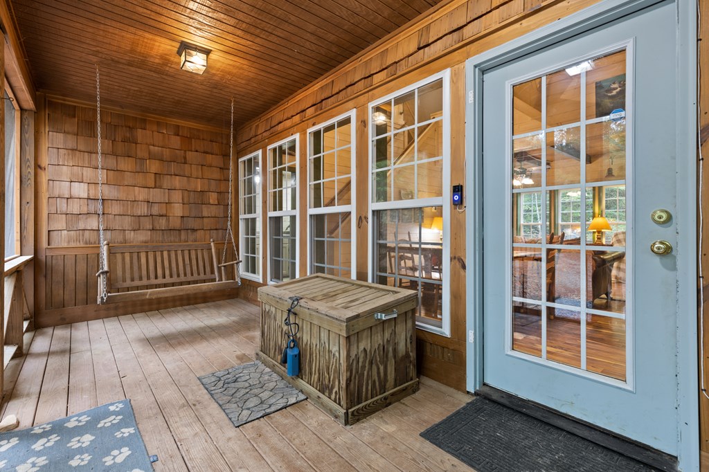 540 Old Mill Road Suches, GA 30572 - Photo 7 of 51 a view of a balcony with door