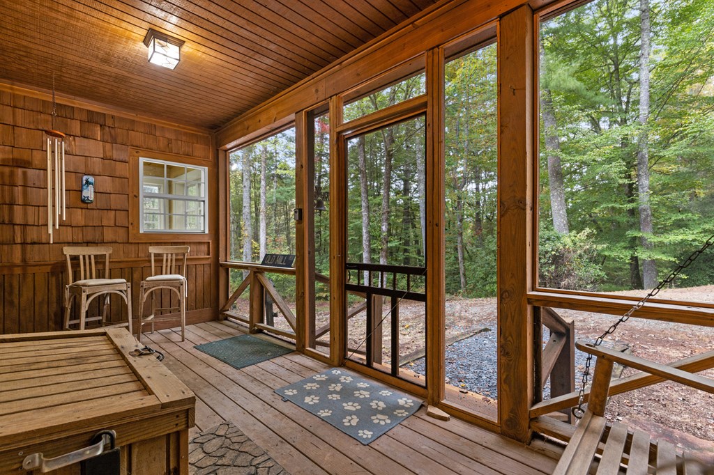 540 Old Mill Road Suches, GA 30572 - Photo 8 of 51 a view of a balcony with wooden floor