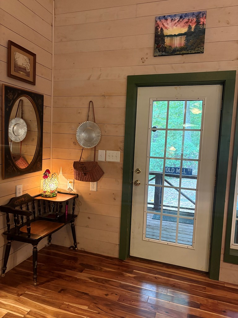 540 Old Mill Road Suches, GA 30572 - Photo 9 of 51 a view of a room that has a table and a chair