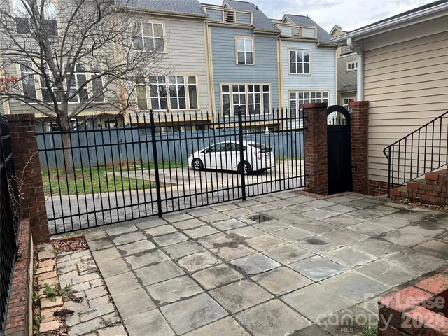 a view of a black gate