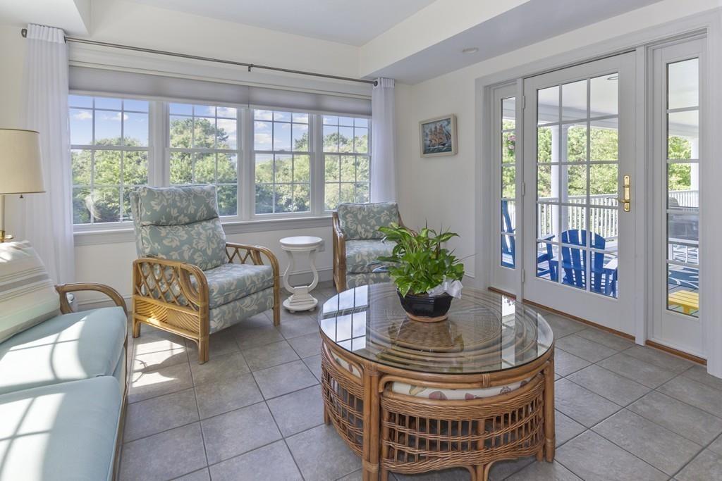 171 Great Neck Road Wareham, MA 02571 - Photo 13 of 26 a living room with furniture and a potted plant