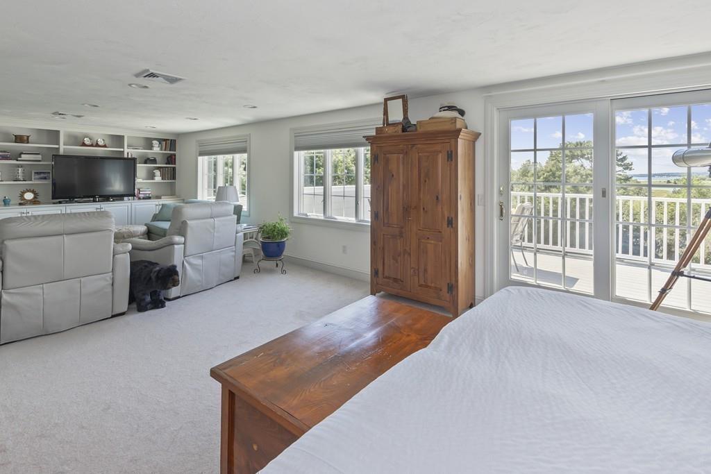 171 Great Neck Road Wareham, MA 02571 - Photo 14 of 26 a living room with furniture and large windows