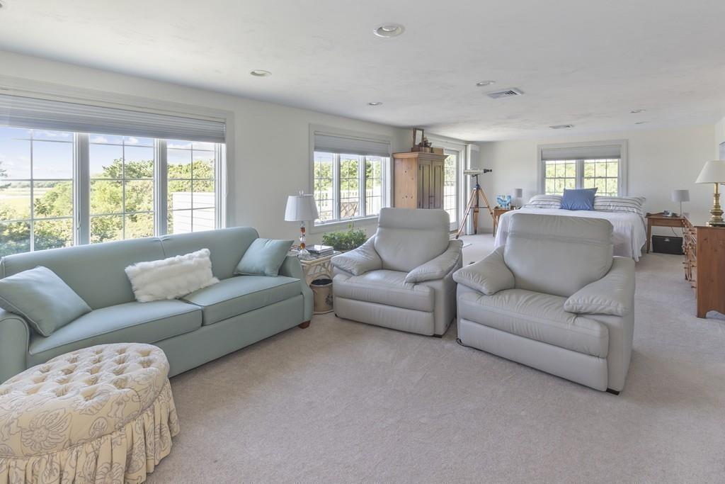 171 Great Neck Road Wareham, MA 02571 - Photo 19 of 26 a living room with furniture and a large window
