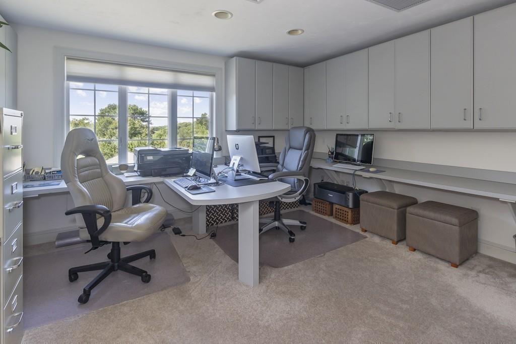 171 Great Neck Road Wareham, MA 02571 - Photo 21 of 26 a view of a workspace with furniture and a window