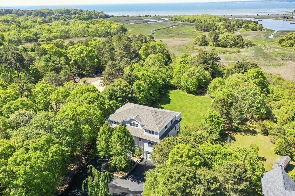 171 Great Neck Road Wareham, MA 02571 - Photo 25 of 26 a view of a yard with an outdoor seating