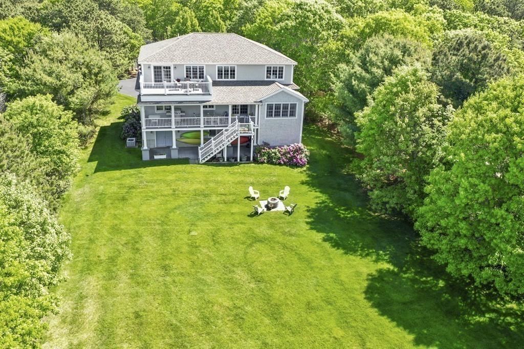 171 Great Neck Road Wareham, MA 02571 - Photo 7 of 26 a view of a house with a backyard