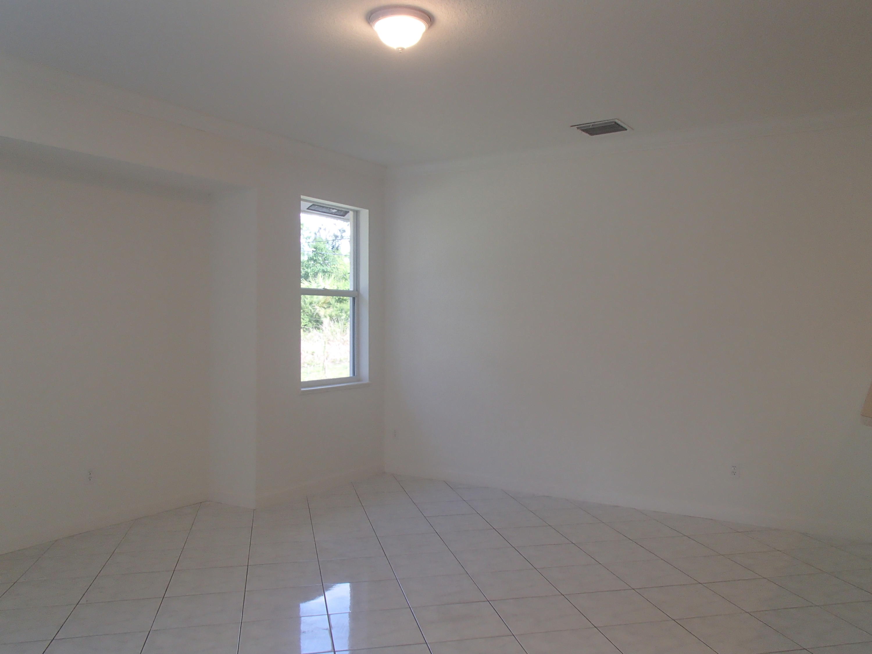 1061 Southwest Bay State Road Port St. Lucie, FL 34953 - Photo 5 of 15 P4070451.JPG