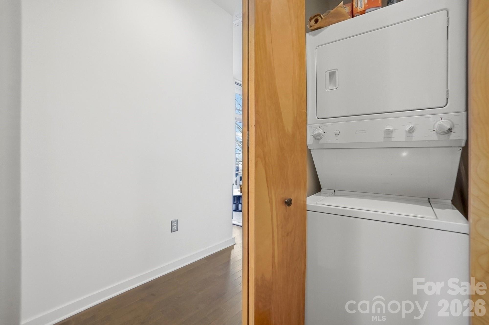 2116 McClintock Road, Unit 221 Charlotte, NC 28205 - Photo 26 of 44 a close up view of a washer and dryer