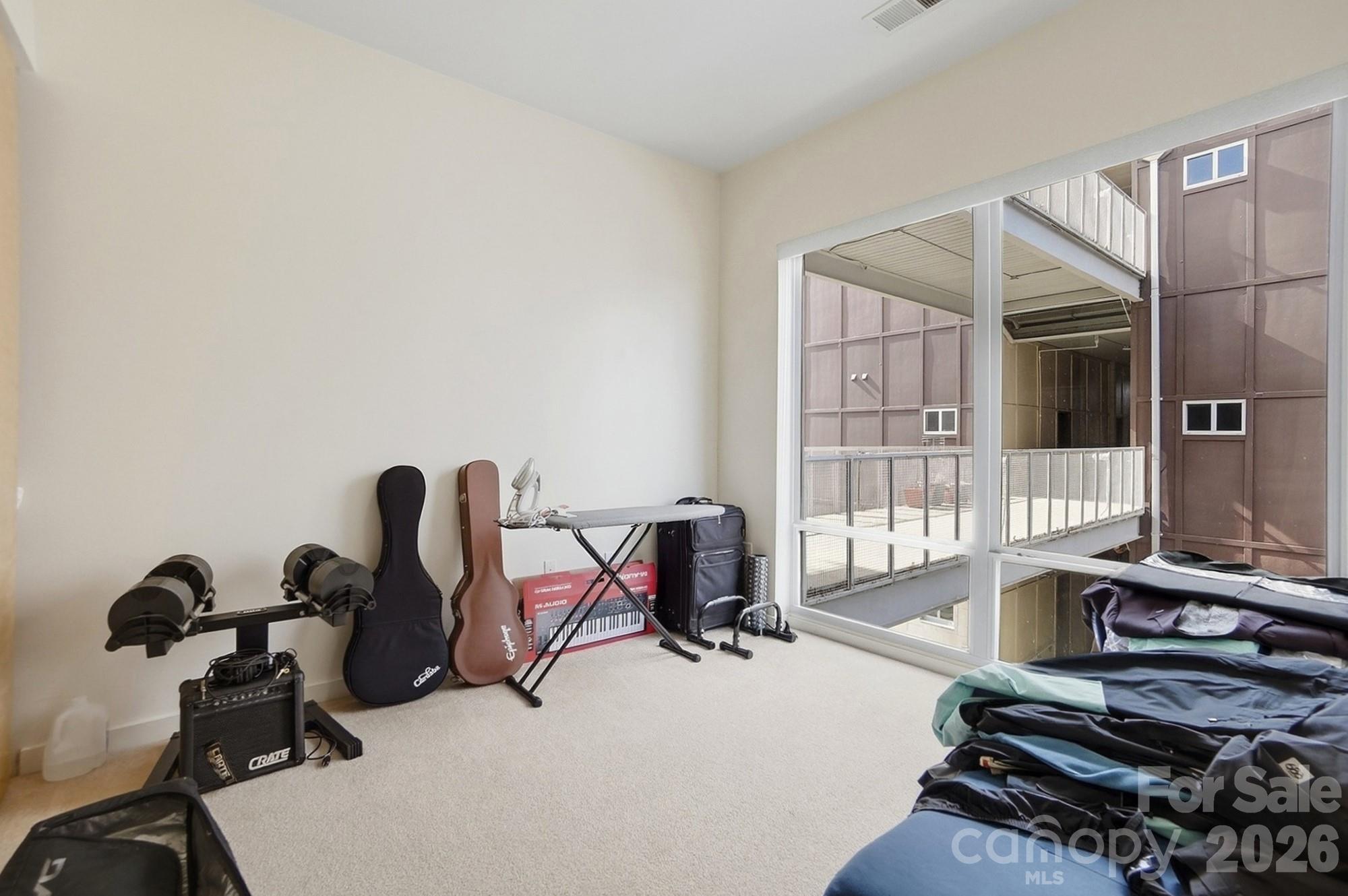 2116 McClintock Road, Unit 221 Charlotte, NC 28205 - Photo 27 of 44 a view of a workspace with furniture