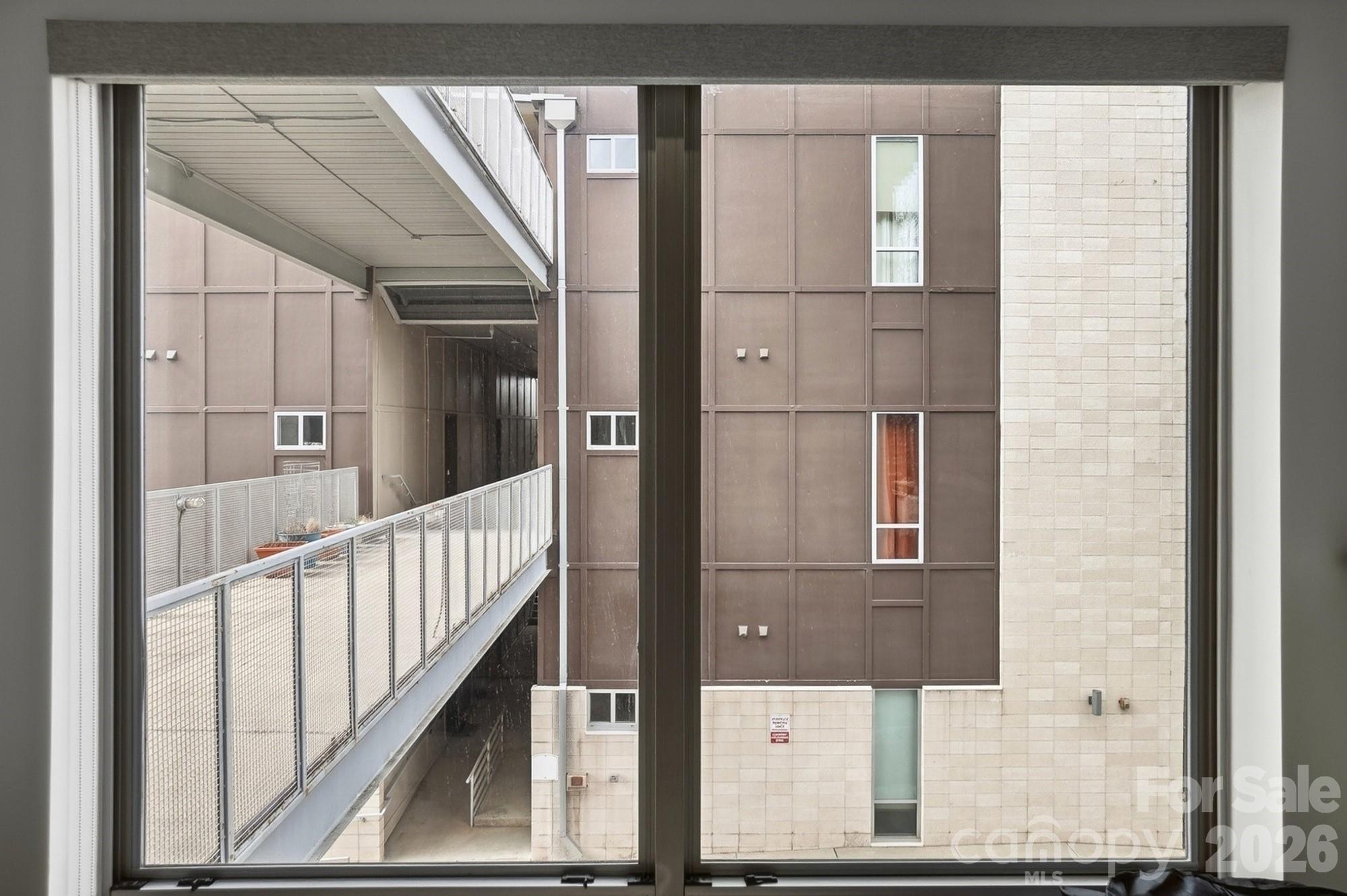 2116 McClintock Road, Unit 221 Charlotte, NC 28205 - Photo 29 of 44 a view of balcony