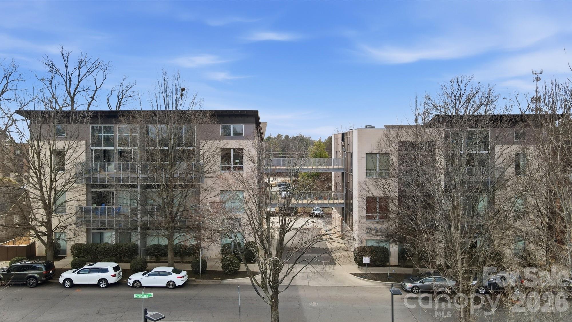 2116 McClintock Road, Unit 221 Charlotte, NC 28205 - Photo 38 of 44 a view of a street with a building in the background