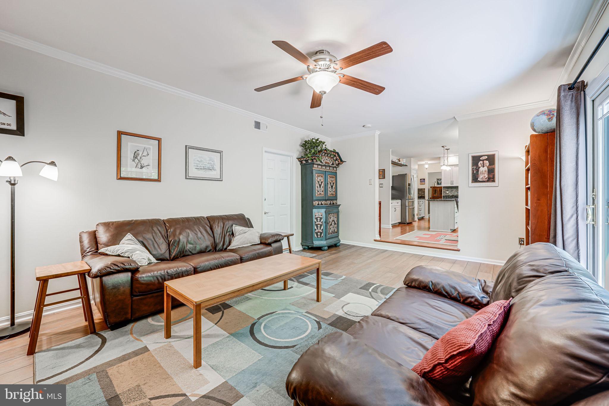 9802 Natick Road Burke, VA 22015 - Photo 18 of 45 a living room with furniture and a large window